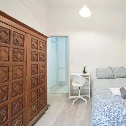 Rent this 6 bed room on Rua Francisco Sanches 45 in 1170-141 Lisbon, Portugal