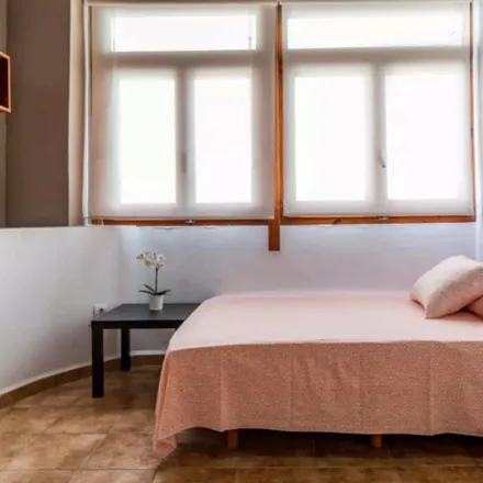 Rent this 4 bed room on Conqueridor in Carrer de Cervantes, 46001 Valencia