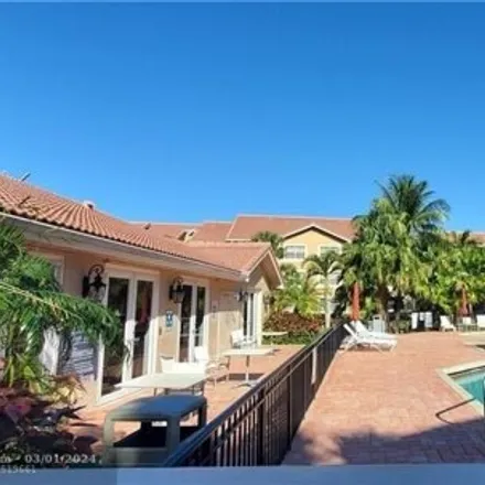 Rent this 2 bed condo on 8851 Alpinia Drive in Coral Springs, FL 33067
