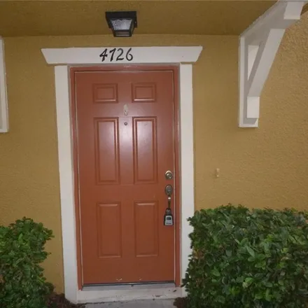 Rent this 2 bed townhouse on 8698 Tamiami Trail in East Tampa, Hillsborough County