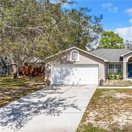 Buy this 3 bed house on 7990 Ravenwood Cove in Spring Hill, FL 34606