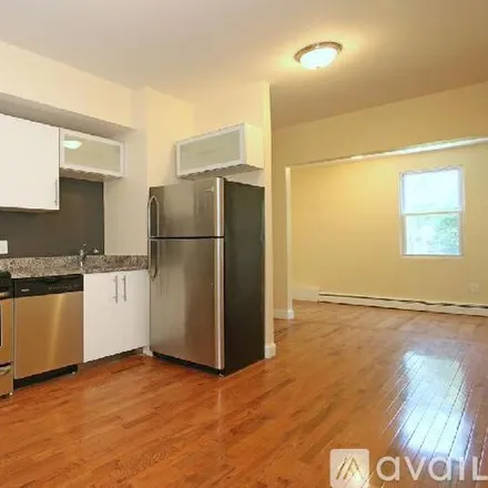 Rent this 4 bed apartment on 114 Everett St