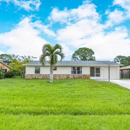 Buy this 3 bed house on 713 Northwest Bayard Avenue in Port Saint Lucie, FL 34983