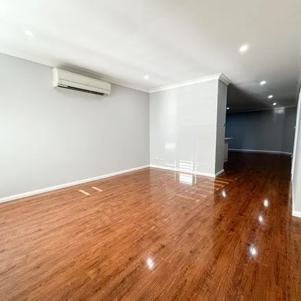 Rent this 5 bed apartment on Kobina Avenue in Glenmore Park NSW 2745, Australia
