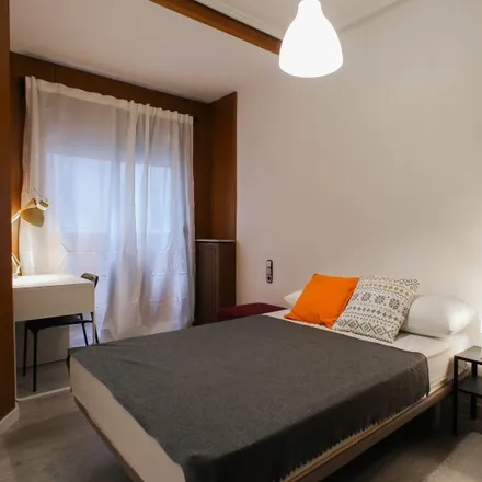 Rent this 7 bed room on Plaça de Sant Agustí in Valencia, Spain