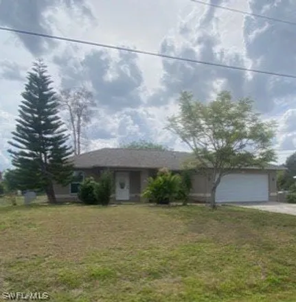 Rent this 3 bed house on 224 Ancona Street in Lehigh Acres, FL 33913