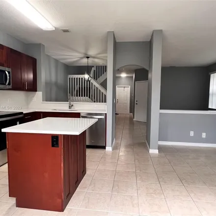 Rent this 4 bed apartment on 4070 Northwest 91st Terrace in Sunrise, FL 33351