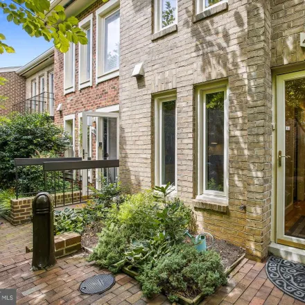 Buy this 3 bed townhouse on 4369 Embassy Park Drive Northwest in Washington, DC 20016
