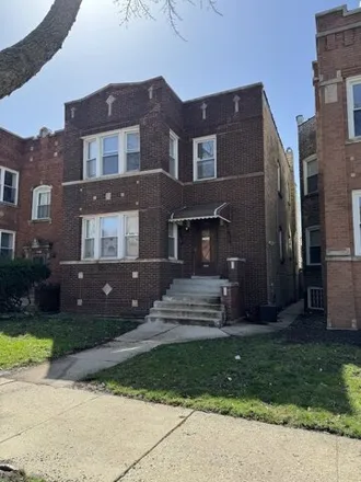Rent this 2 bed house on 4839 West Wolfram Street in Chicago, IL 60641