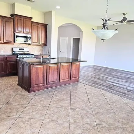 Rent this 4 bed apartment on 2446 Winding Creek Drive in Missouri City, TX 77545