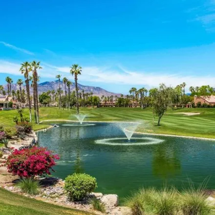 Buy this 2 bed condo on Oasis Country Club Golf Course in Sari Court, Palm Desert