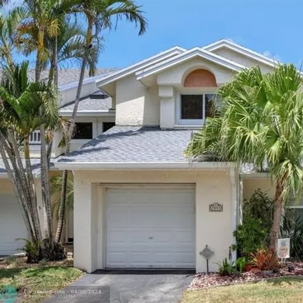 Buy this 2 bed house on Discovery Circle East in Deerfield Beach, FL 33442