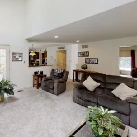 Rent this 5 bed apartment on 967 Rustling Oaks Drive