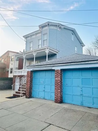 Buy this 7 bed house on 124-07 22nd Avenue in New York, NY 11356