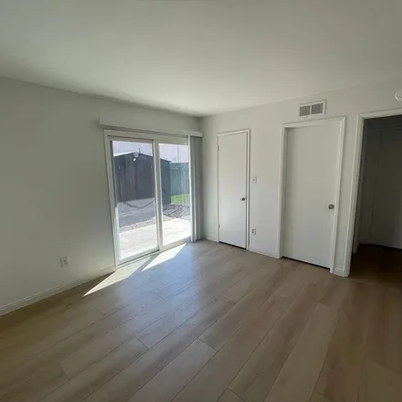 Rent this 3 bed apartment on 2212 East Avalon Avenue in Santa Ana, CA 92705