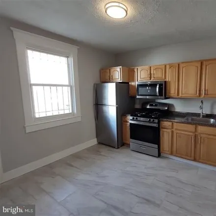 Buy this 3 bed house on 407 Poplar Grove Street in Baltimore, MD 21223