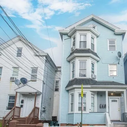 Buy this 9 bed house on 71 Mercer St in Paterson, New Jersey