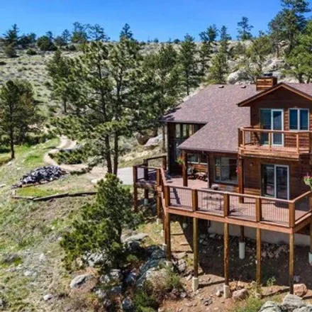 Buy this 3 bed house on 283 Guardian Peak Drive in Larimer County, CO 80536