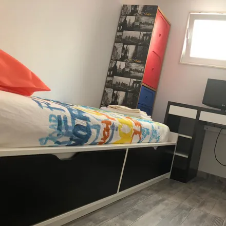 Rent this 3 bed room on Rua Sebastião Saraiva Lima in 1170-347 Lisbon, Portugal