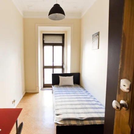 Rent this 4 bed room on Rua Sebastião Saraiva Lima 66 in 1170-347 Lisbon, Portugal