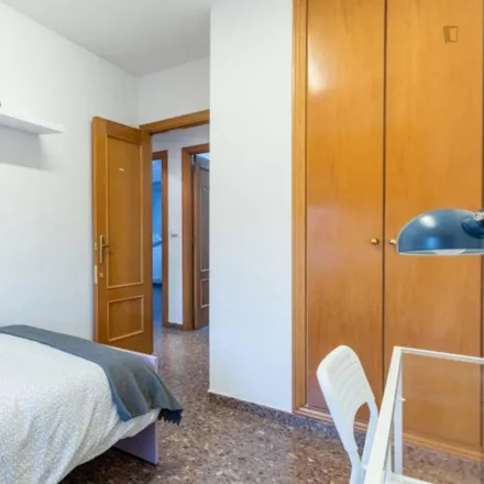 Rent this 4 bed room on Joaquín Benlloch - Illa Cabrera in Carrer de Joaquín Benlloch, 46026 Valencia