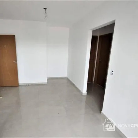Buy this 2 bed apartment on Rua 26 de Janeiro in Mirim, Praia Grande - SP