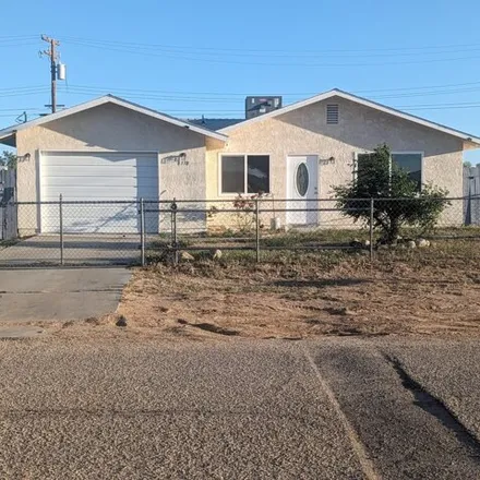 Buy this 3 bed house on 8318 Quezon Ave in California City, California