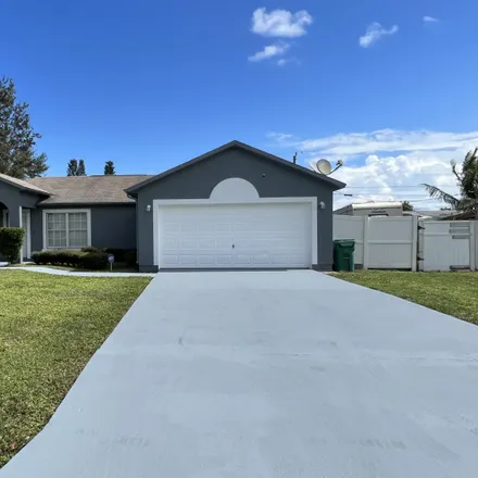 Buy this 3 bed house on Northeast Oleander Avenue in Saint Lucie County, FL 34983