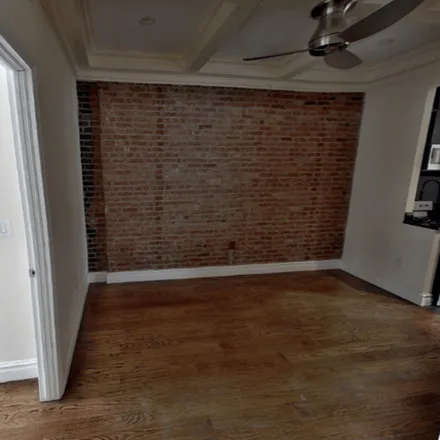 Rent this 4 bed apartment on 405 West 51st Street in New York, NY 10019