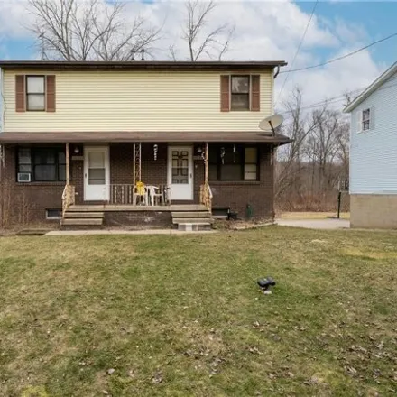 Buy this 4 bed house on 1245 Sparhawk Avenue in Akron, OH 44305