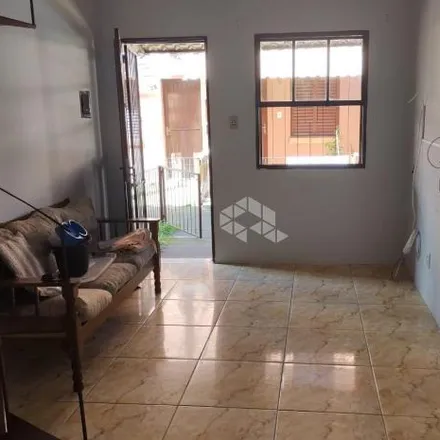 Buy this 2 bed house on Rua Jacundá in Guarujá, Porto Alegre - RS