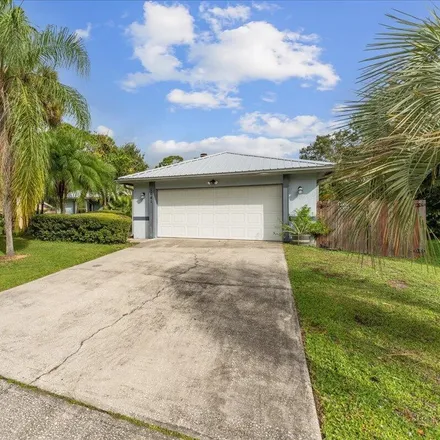 Buy this 3 bed house on 1037 Lynbrook Street Northwest in Palm Bay, FL 32907