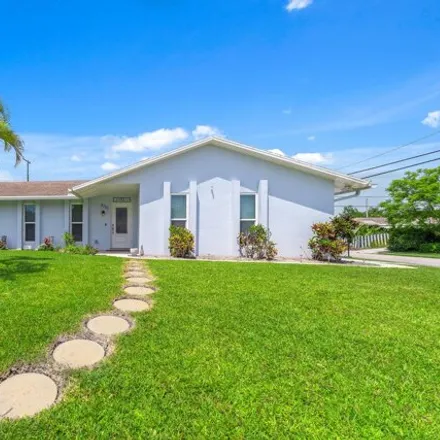 Buy this 4 bed house on 3716 Buttercup Circle South in North Palm Beach, FL 33410