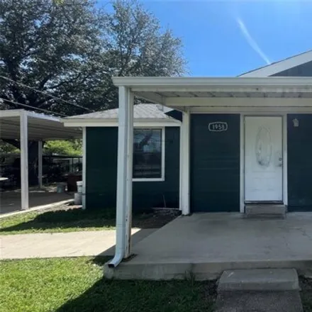 Rent this 4 bed house on 1950 Calypso Street in Dallas, TX 75212