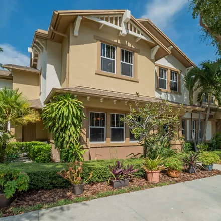 Buy this 3 bed townhouse on 690 Pacific Grove Drive in West Palm Beach, FL 33401