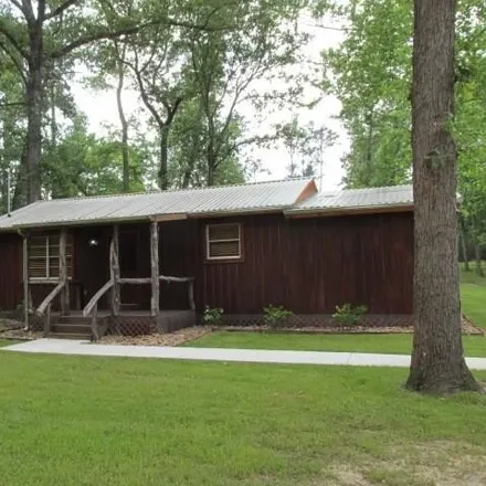 Rent this 2 bed house on 8158 TX 75 in Huntsville, TX 77340