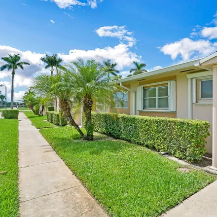 Buy this 2 bed townhouse on 2560 Dudley Drive East in Palm Beach County, FL 33415