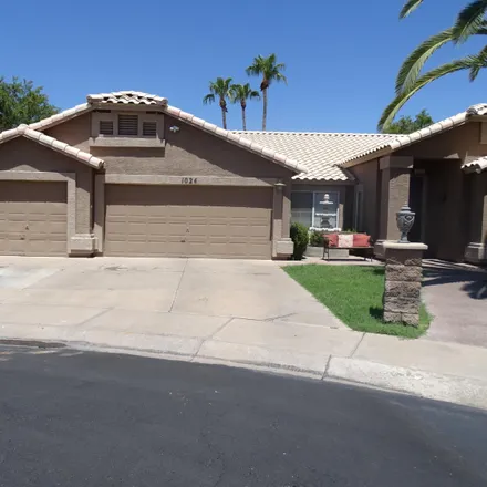Rent this 4 bed house on 1026 West Starward Court in Gilbert, AZ 85233