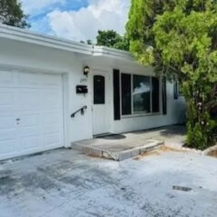 Rent this 2 bed house on 2481 Northwest 2nd Terrace in Sanders Park, Pompano Beach
