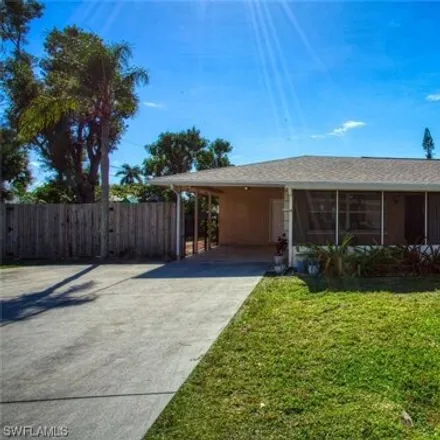 Buy this 3 bed house on 1306 Macombo Road in Cypress Lake, FL 33919