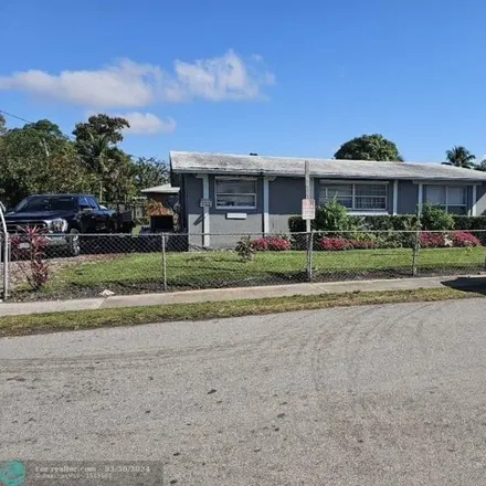 Buy this 4 bed house on 2877 Northwest 1st Street in Lauderhill, FL 33311