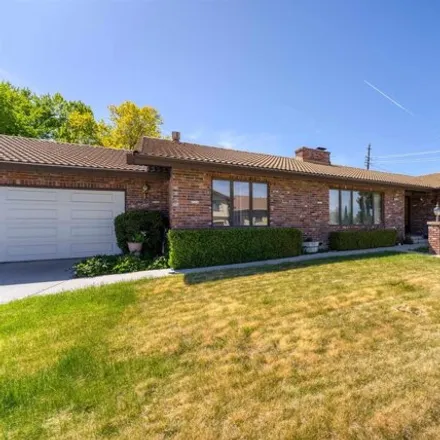 Buy this 4 bed house on 1713 Aquila Avenue in Reno, NV 89509