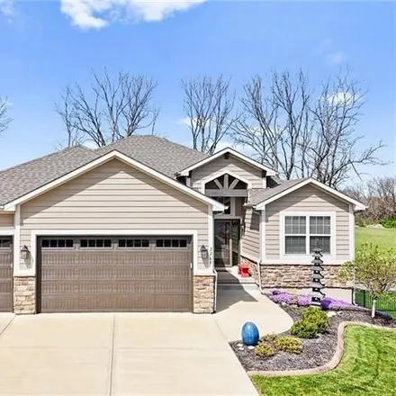 Buy this 4 bed house on 2272 Southwest Morris Drive in Lee's Summit, MO 64082