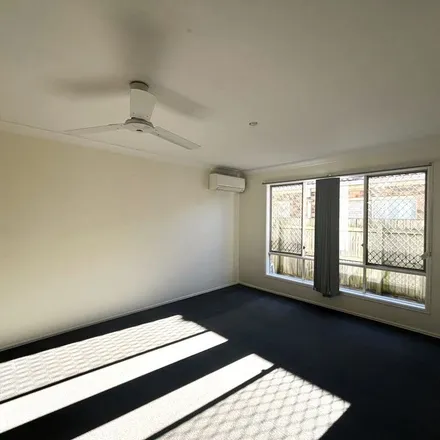 Rent this 4 bed apartment on 8A Coolabah Crescent in Bridgeman Downs QLD 4035, Australia