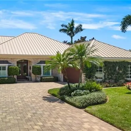 Buy this 3 bed house on 810 Tallow Tree Ct in Naples, Florida