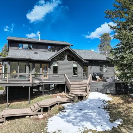 Buy this 5 bed house on South Snowshoe Trail in Jefferson County, CO 80439