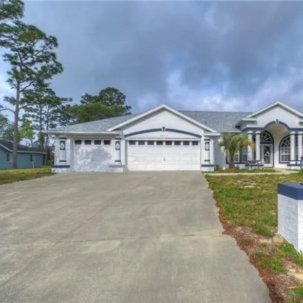 Buy this 3 bed house on 2043 Millmount Lane in Spring Hill, FL 34609