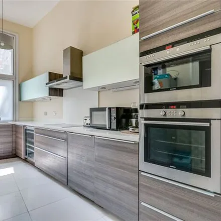 Rent this 3 bed apartment on 2 in 4 Lillie Road, London