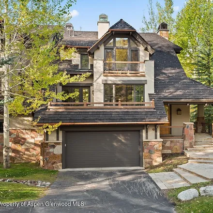 Rent this 4 bed townhouse on 304 Streamside Court in Snowmass Village, Pitkin County