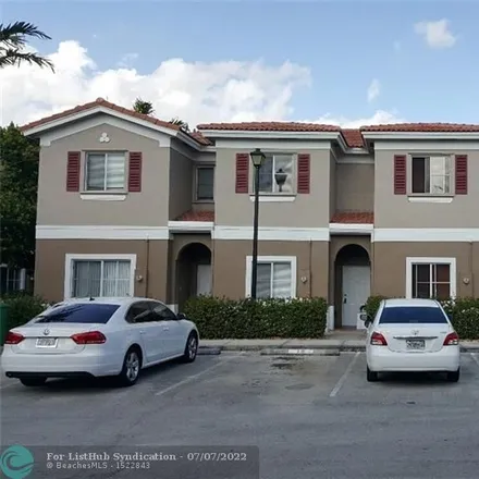 Buy this 3 bed condo on 4513 Woodland Circle in Tamarac, FL 33319